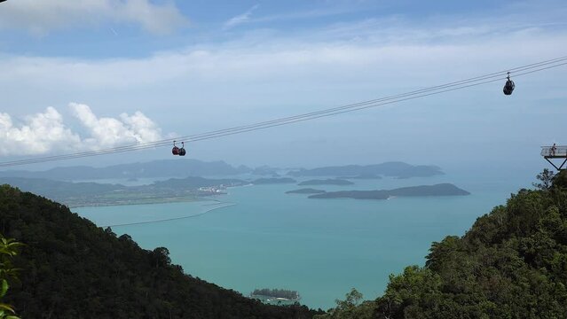 Strait of Malacca behind cable cars on Langkawi mountain in Malaysia