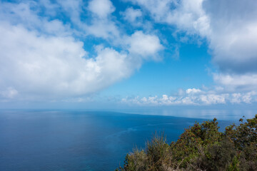 Fototapeta premium Stunning view down to the sea and the surrounding area from top of the mountain in Ereikoussa island, Greece