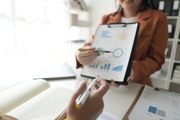 Business People Meeting to discuss and brainstorming the financial report paperwork in home office