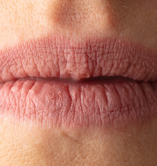 Obraz premium Lips on a girl's face. Macro