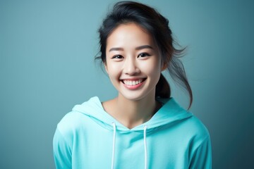 Portrait of a beautiful smiling asian woman in blue hoodie, Asian woman florist creating wedding bouquet in flower shop, AI Generated - obrazy, fototapety, plakaty