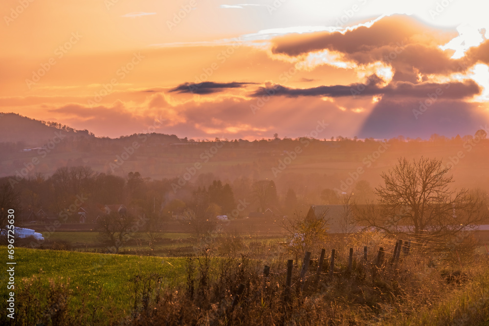 Poster Sunset in a rural landscape view