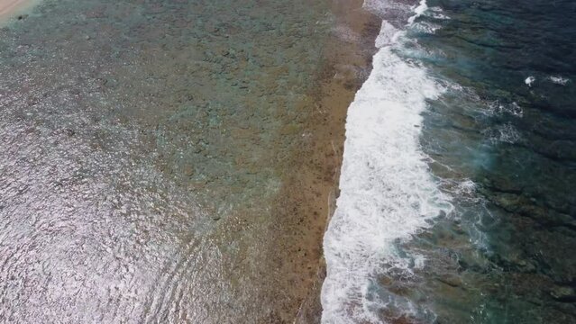 Tilt up shot of ocean water of Northern Mariana Islands