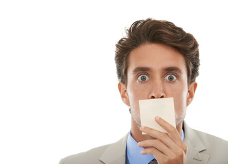 Business, man and sticky note on face in studio with surprise, shocked or wow for secret or mockup space. Entrepreneur, paper and person or mouth with censored, silence and victim in white background