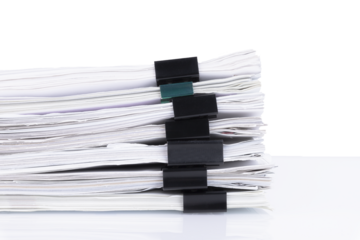 A stack of papers in the office on a white table, Transparent background. PNG.
