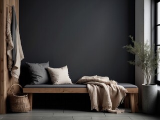 Rustic wood bench with grey cushion, beige and black pillows and woolen blanket