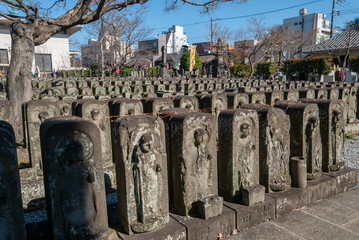 Stone statues of Jizo, the patron deity of children and travelers, in Jomyoin buddhist temple in...