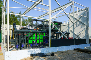 Steel framework of new wood chip biofuel heat power station before installing wall sandwich panels