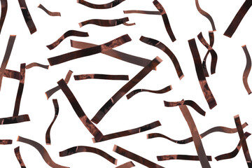 Shiny bronze confetti falling on white background