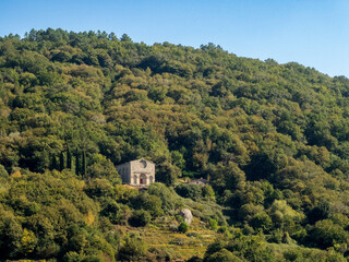 Panoramic view of the Romanesque church of Santo Estevo in Ribas de Miño. Ribeira Sacra, Lugo, Spain.
