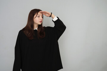Stylish 16-year-old in a sleek black hoodie, perfect for youth advertising and versatile branding...