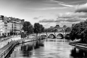 Pont Neuf Bridge and Seine river quay in the 1st arrondissement of Paris city