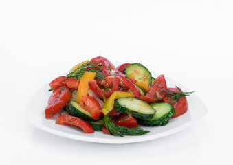 Salad of chopped tomatoes, cucumbers and sweet peppers
