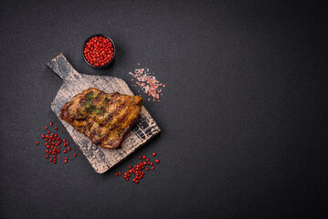 Delicious juicy beef or chicken steak with salt, spices and herbs