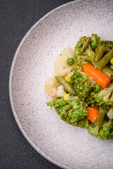 Delicious fresh vegetables steamed carrots, broccoli, cauliflower