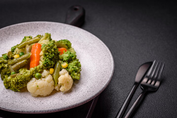 Delicious fresh vegetables steamed carrots, broccoli, cauliflower