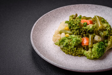 Delicious fresh vegetables steamed carrots, broccoli, cauliflower