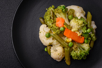 Delicious fresh vegetables steamed carrots, broccoli, cauliflower
