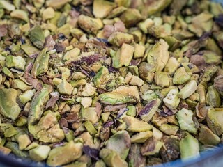 Chopped pile of pistachios in a bowl