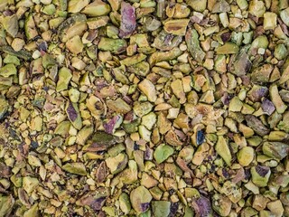 Chopped pile of pistachios in a bowl