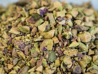 Chopped pile of pistachios in a bowl