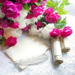 Paper with quill and flowers
