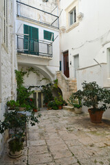 Fototapeta na wymiar A street of Cisternino, a small town in the Puglia region of Italy.