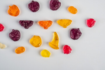 Assorted gummy candies, Juicy colorful jelly sweets. Gummy candies on white background