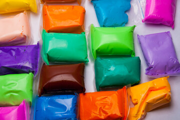 colored air plasticine for children's creativity and motor skills development