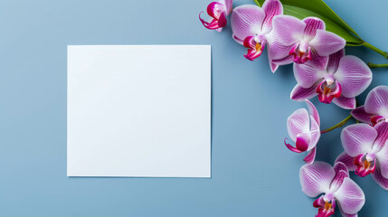 Blank White Greeting Card Mockup with Magenta Orchids. Invitation Card Mockup With Purple Flowers For Special Occasions. Invitation Card in Landscape Format