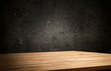 High quality photo of a wooden table on an abstract dark background.