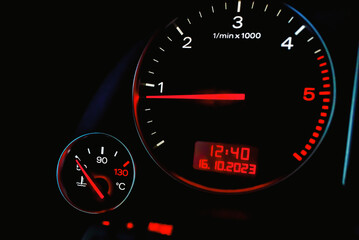 Car's dashboard.Modern car dashboard panel at night time.Closeup,selective focus.