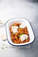 Pasta with tomato sauce, eggplant and cheese