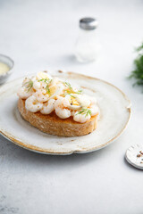 Traditional Scandinavian shrimp sandwich with egg and dill