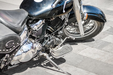 shiny motorcycle chopper on the road close up