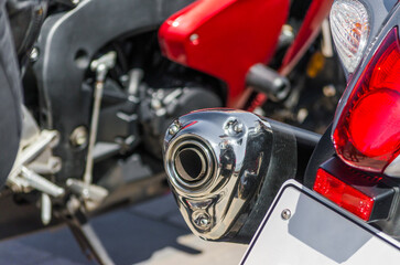 exhaust pipe on the background of a motorcycle close up