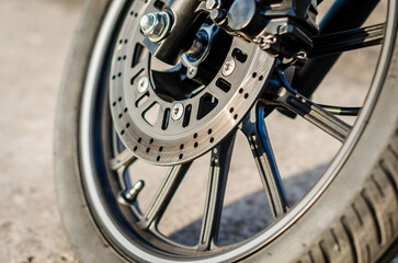 motorcycle wheel with brake disc closeup