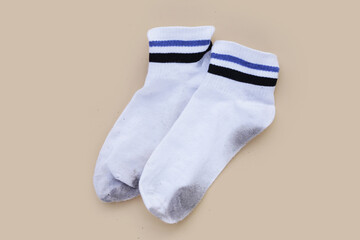 Dirty white socks. Toip view