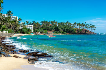 Beautiful Indian Ocean coastline on the island of Sri Lanka, Mirissa. Aerial photography.