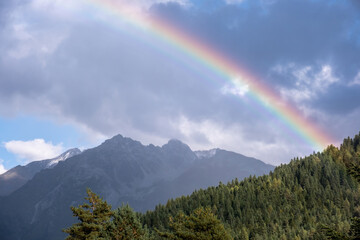 rainbow in the mountains after the rain