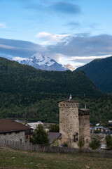 Fototapeta na wymiar Svan medieval towers in the mountains at sunset