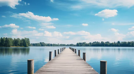 Foto op Plexiglas Small wooden bridge in lake with calm water and blue sky in Sweden, Scandinavia, Europe. Peaceful outdoor © daniel