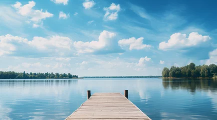 Foto op Canvas Small wooden bridge in lake with calm water and blue sky in Sweden, Scandinavia, Europe. Peaceful outdoor © daniel