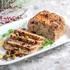 Duck terrine with cistachios and dried cranberries