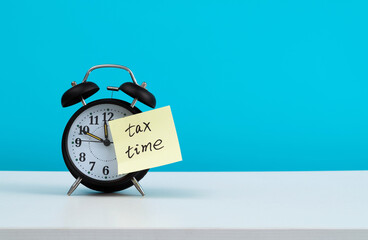 Tax time sticky on alarm clock