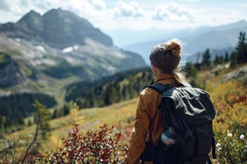 Fototapeta na wymiar Woman on a mountain hike, scenic view, backpack, adventurous