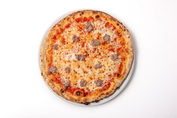 White Italian pizza with mozzarella tomato sauce and sausage from above on a white background

