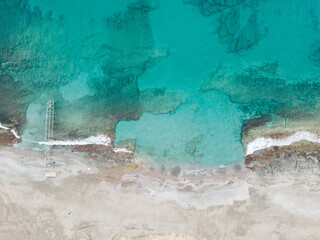 Drone shot of the sea and beach