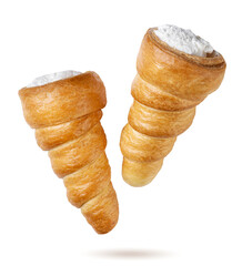 Puff pastry cream horn flying on a white background. Isolated