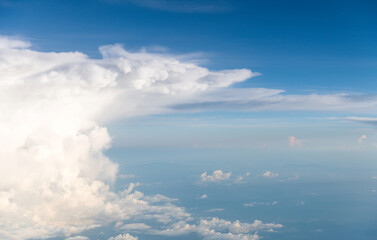Naklejka na ściany i meble Aerial view of white large cloud